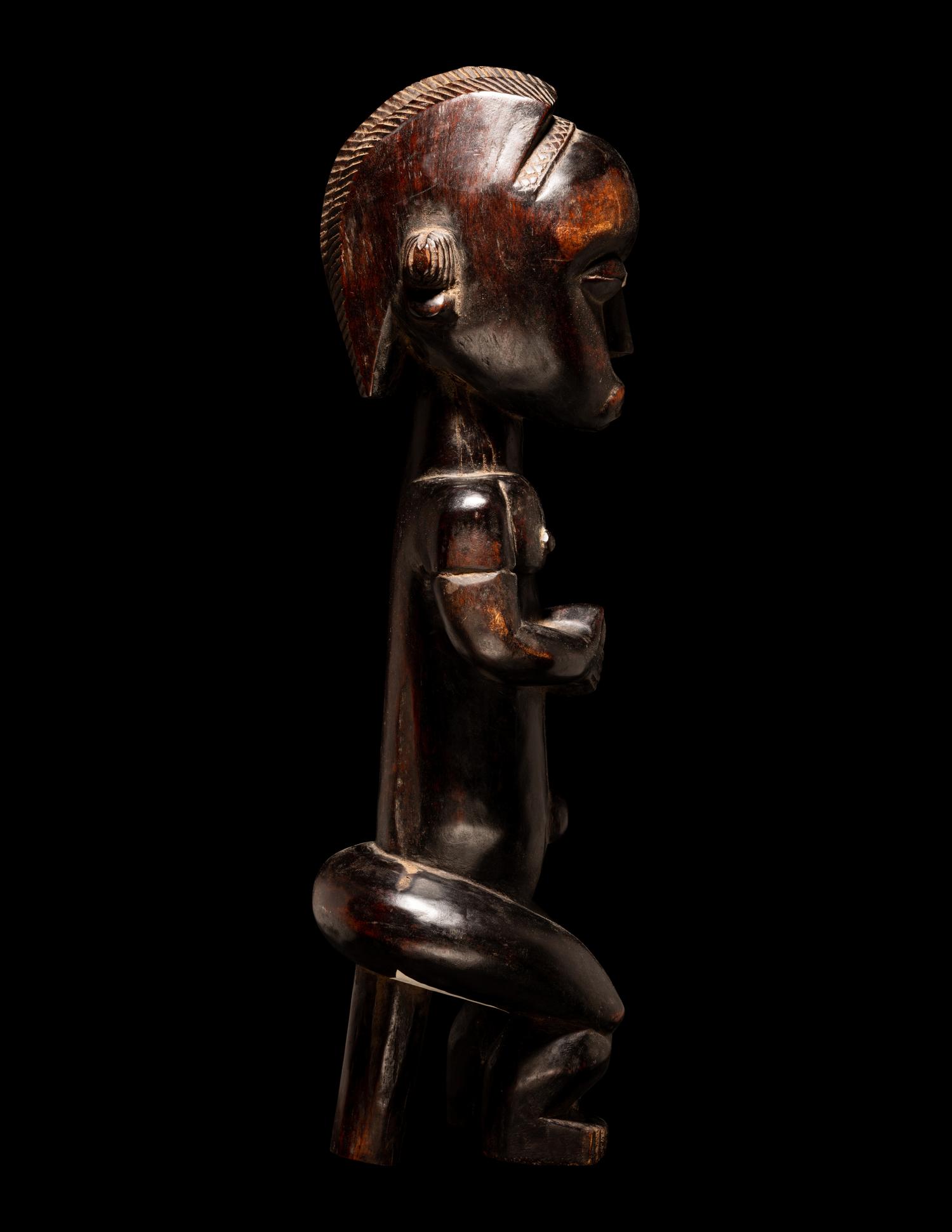 A Fang Wood Standing Figure