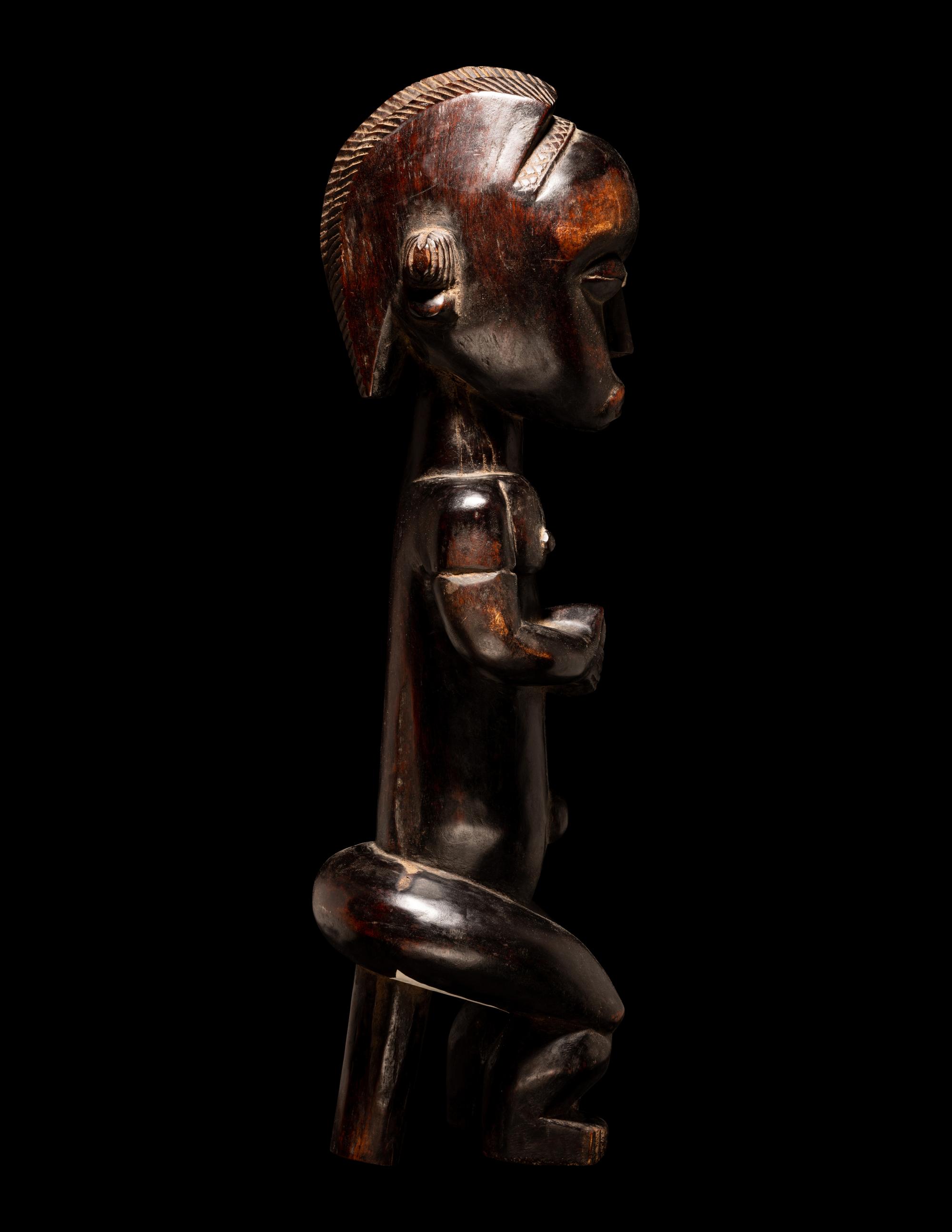 A Fang Wood Standing Figure