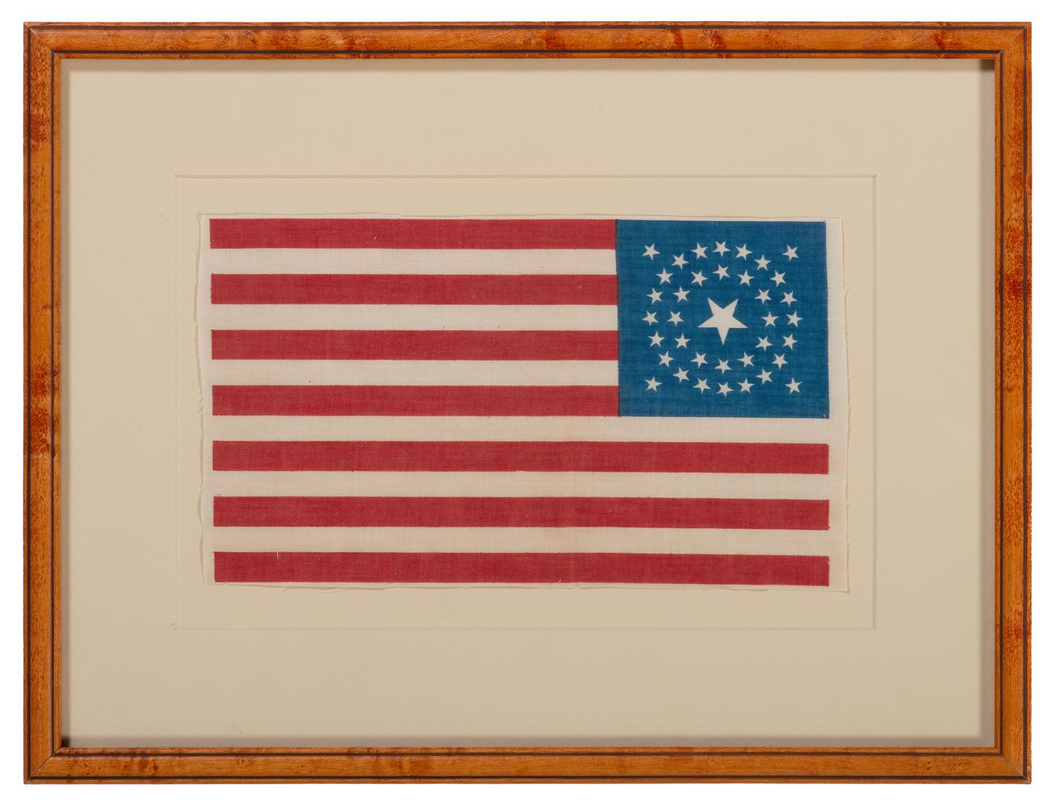 [FLAGS]. 37-star American parade flag with double-medallion configuration. Ca 1867-1876.