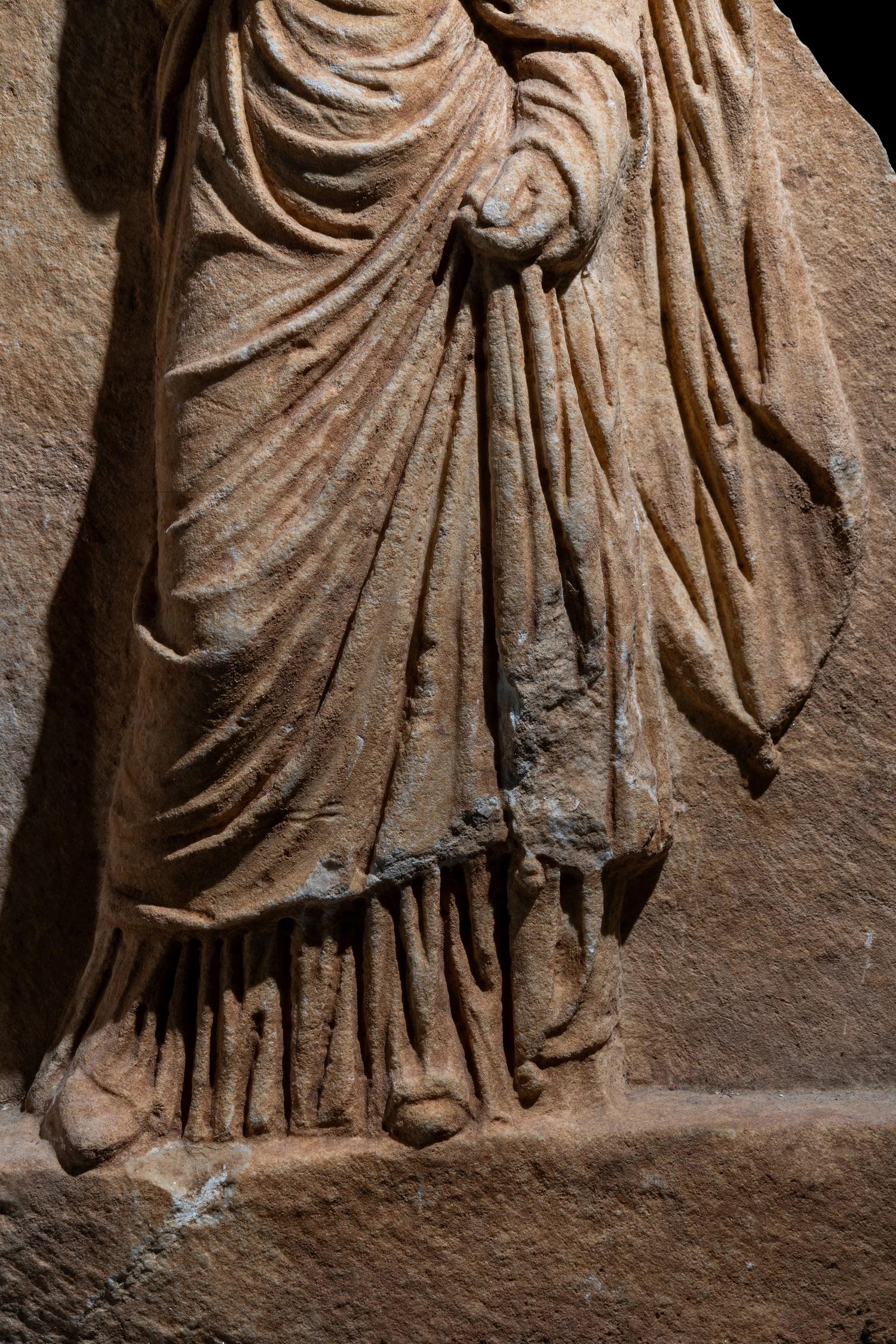 A Roman Marble Funerary Relief Fragment