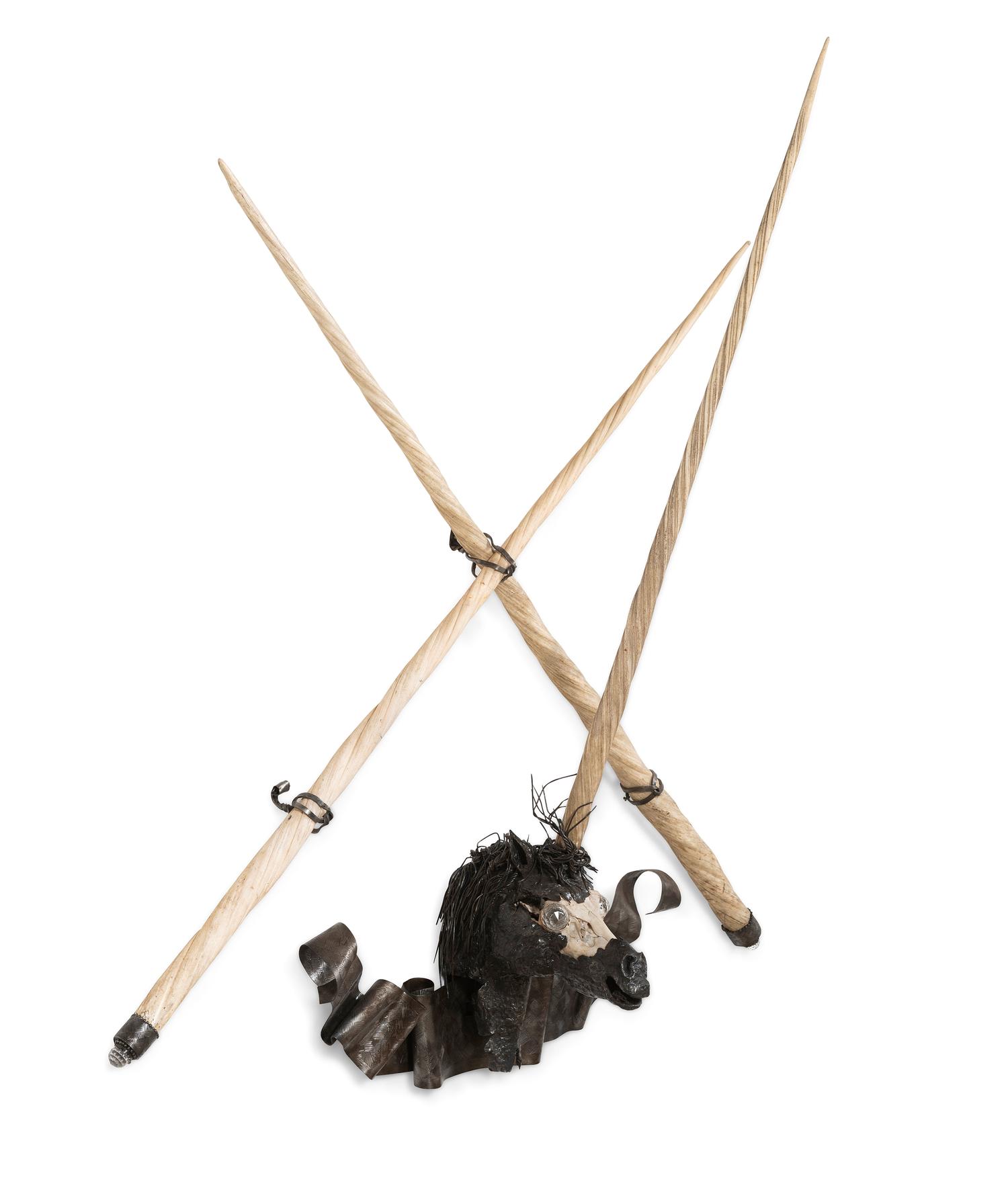 A Cast Metal, Bone, and Narwhal Tusk Installation