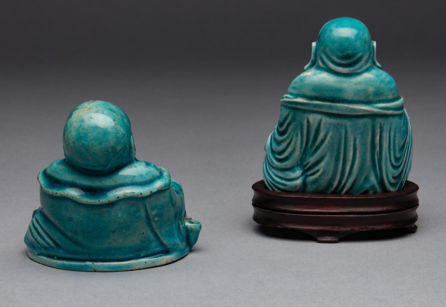 Two Turquoise Glazed Porcelain Figures of Budai Buddhas