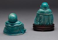 Two Turquoise Glazed Porcelain Figures of Budai Buddhas