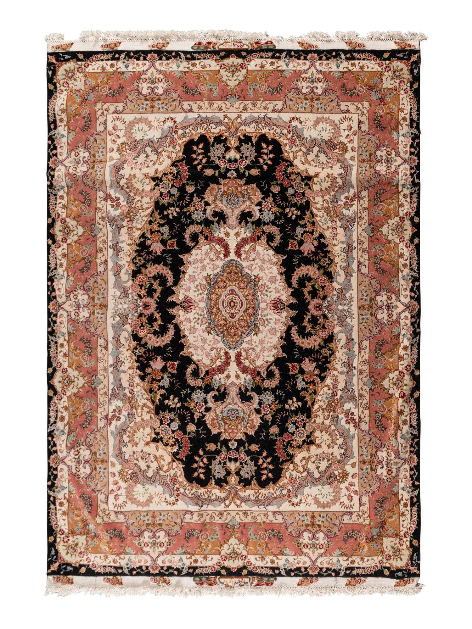 A Qom Silk Rug