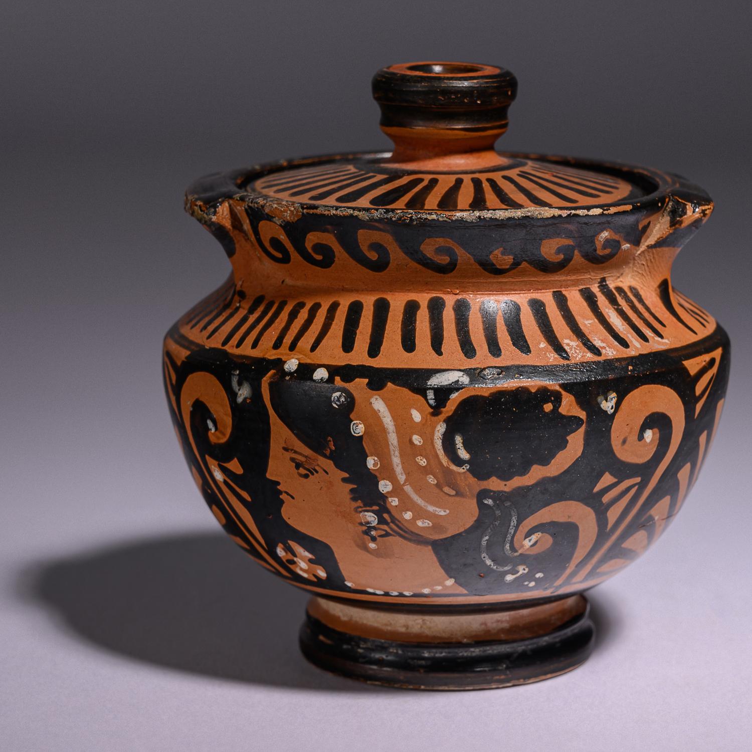 An Apulian Red-Figured Lidded Pyxis