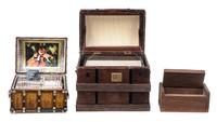 A Group of Three Trunks Largest height 3 1/8 x width 3 x depth 2 inches.