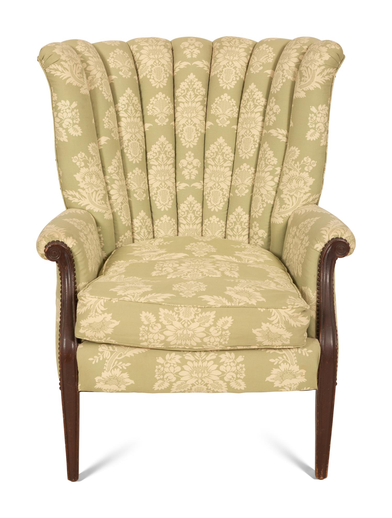 A Green and White Channel Upholstered Mahogany Armchair