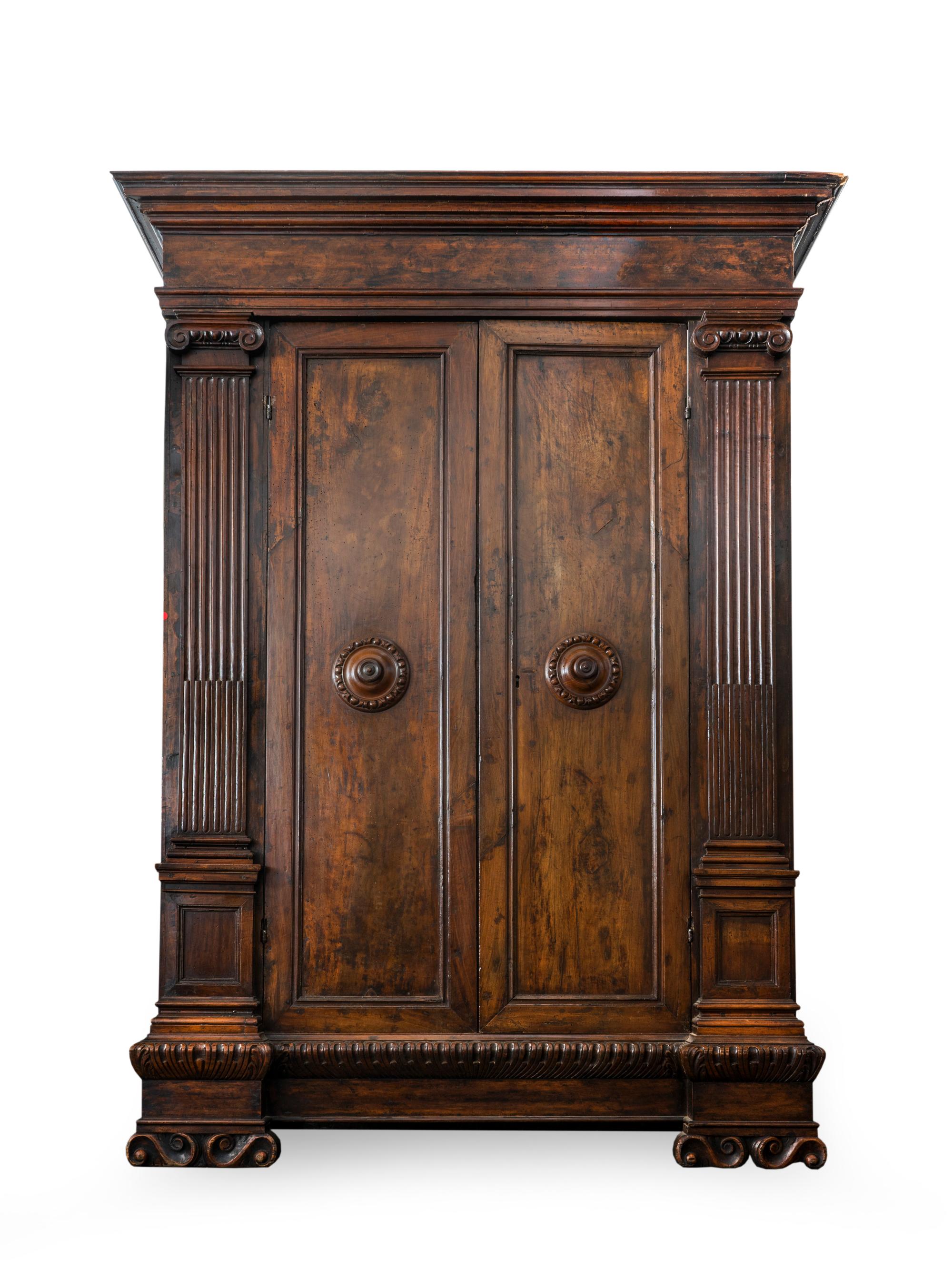 An Italian Renaissance Style Carved Walnut Armoire — 19TH CENTURY