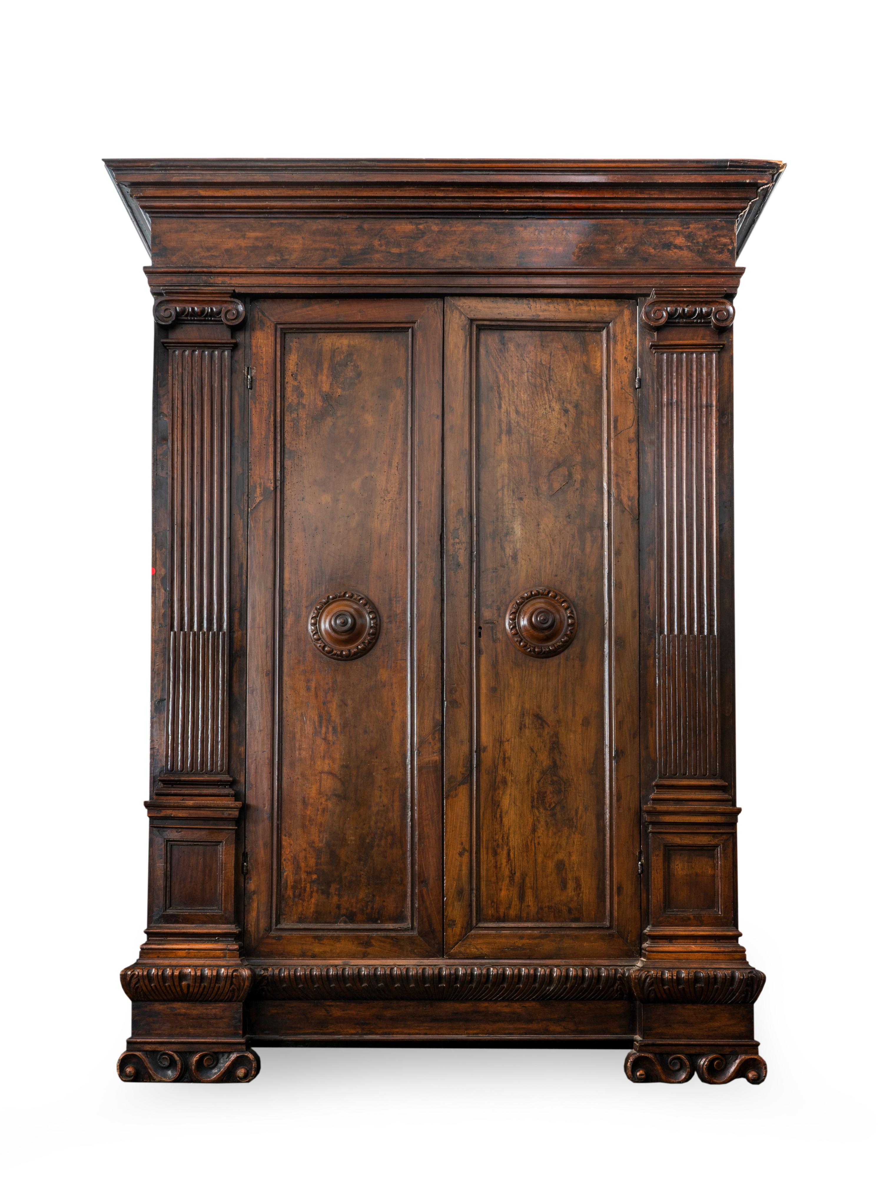 An Italian Renaissance Style Carved Walnut Armoire — 19TH CENTURY