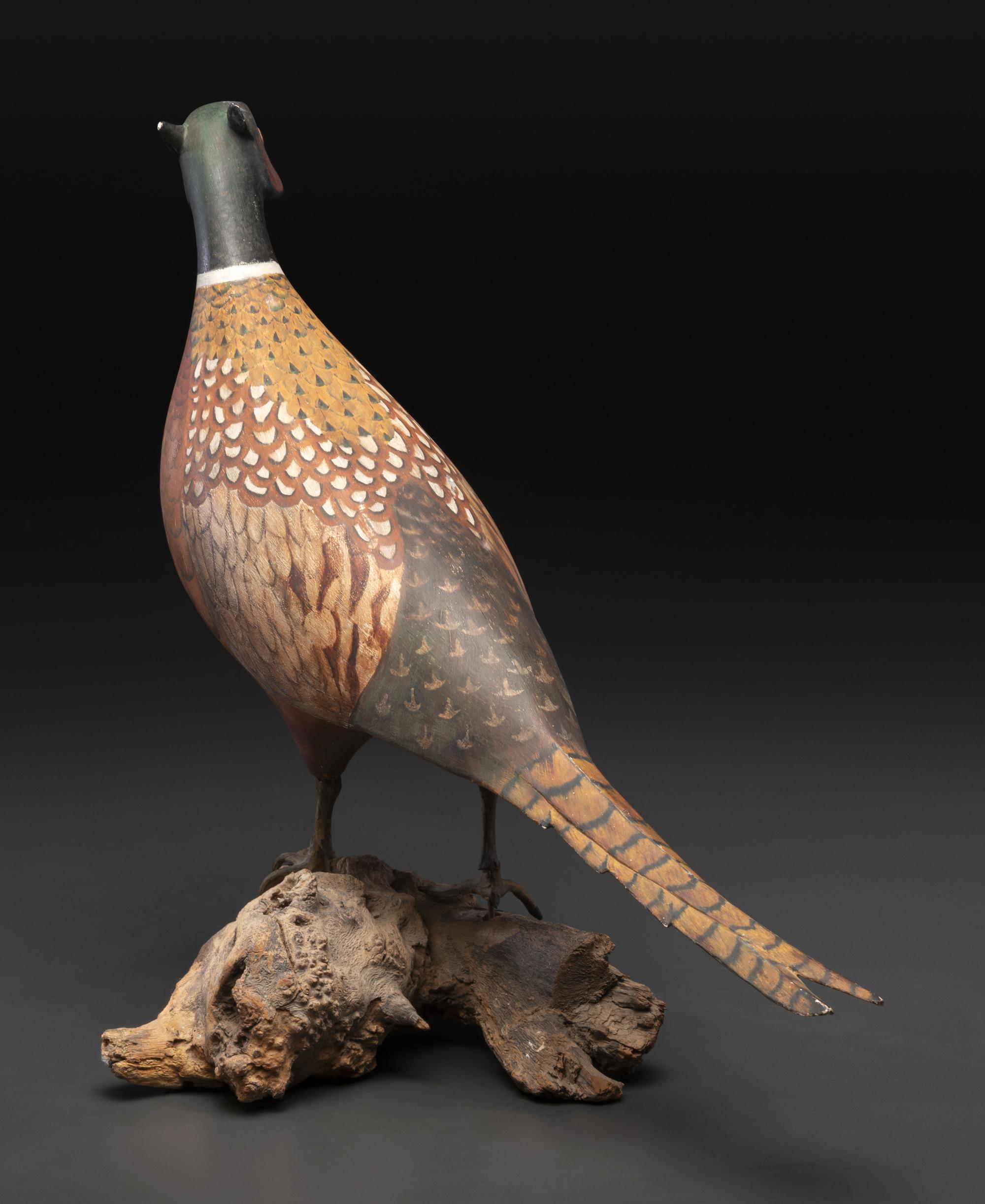 A Carved and Painted Wood Pheasant Decoy
