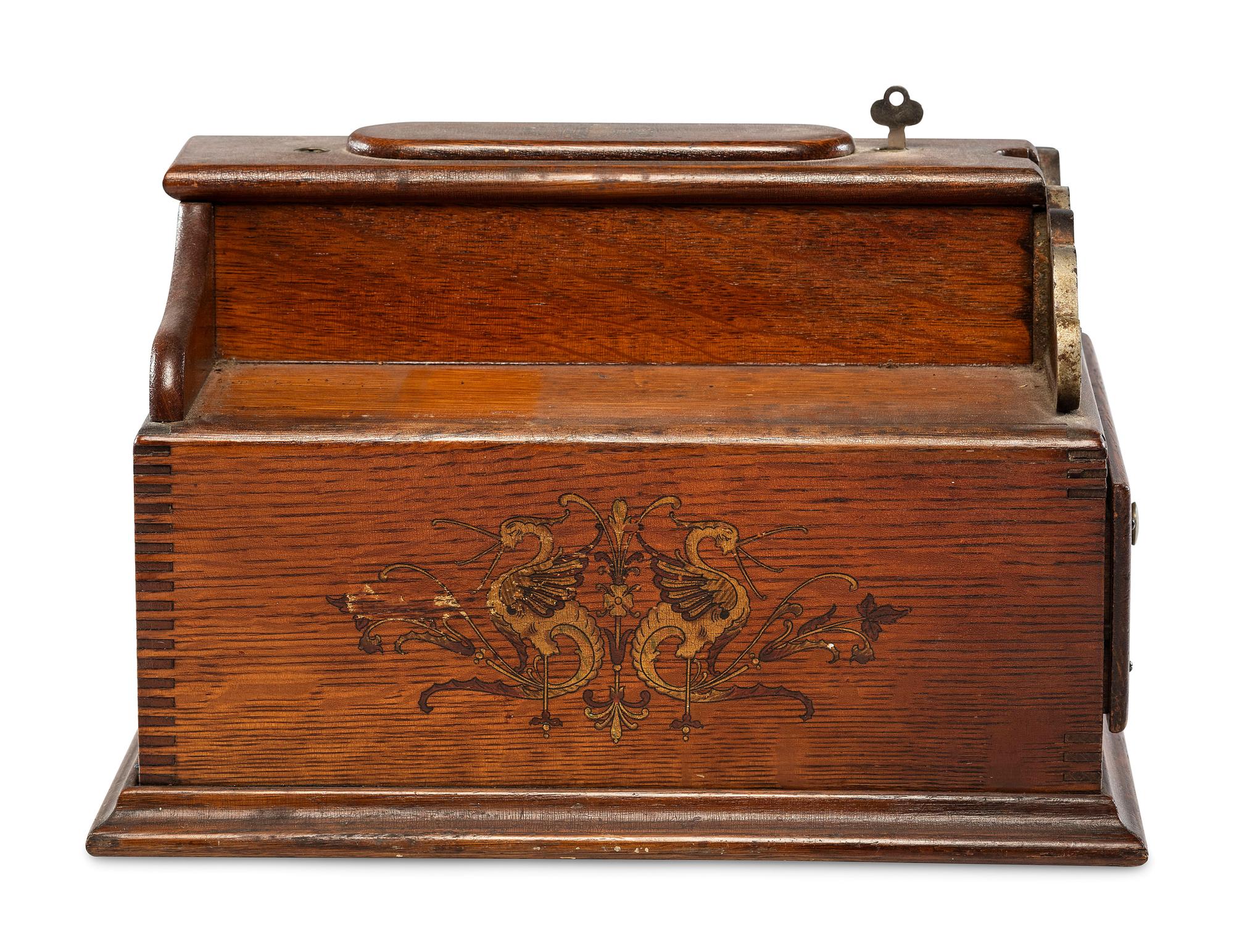 A Monitor Paint Decorated Oak and Cast Iron Coin-Operated Barbershop Cash Register