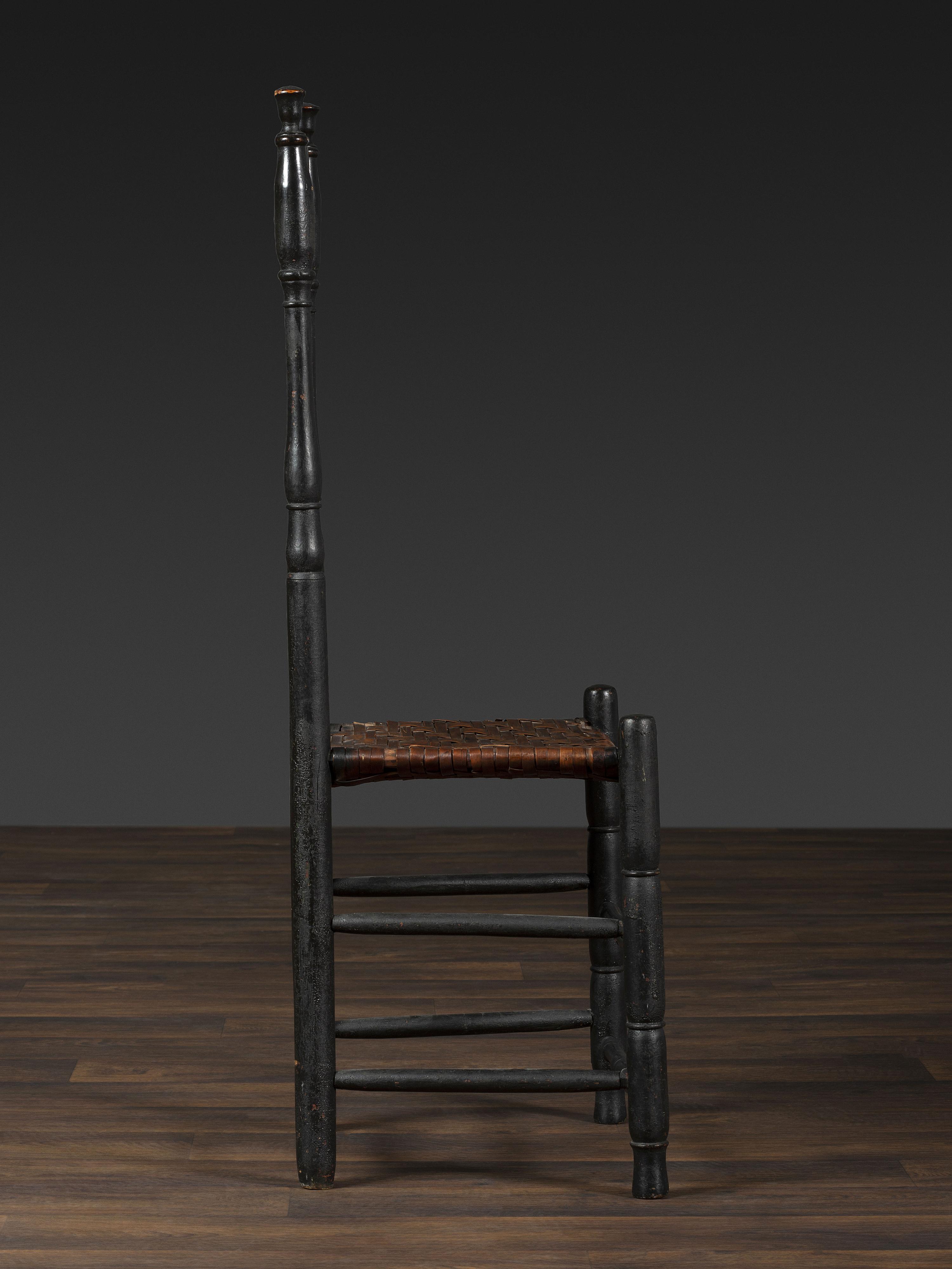 A Queen Anne Black Painted 'Heart and Crown' Splint Seat Side Chair