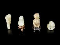 Four Celadon Jade Figures