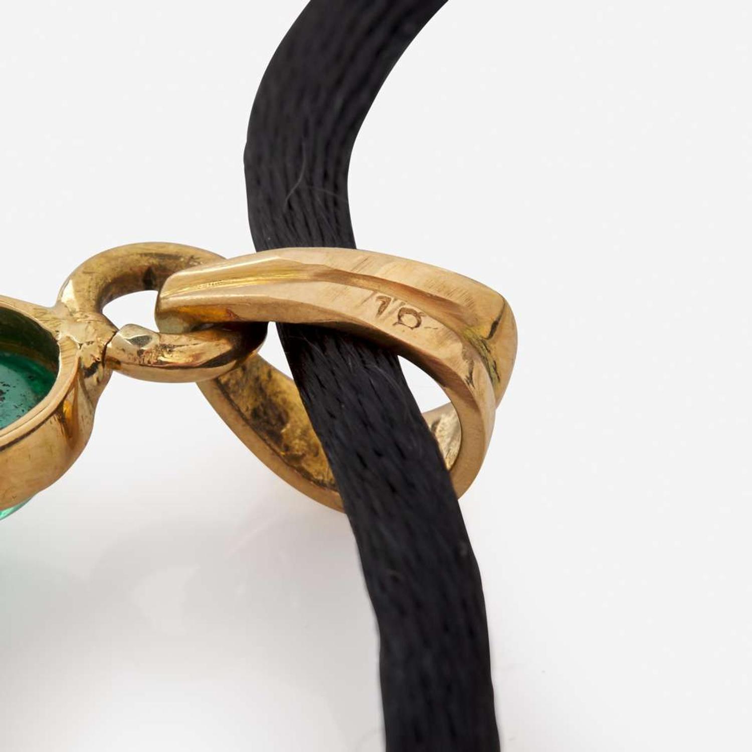 A Diamond, Garnet, and Emerald Necklace