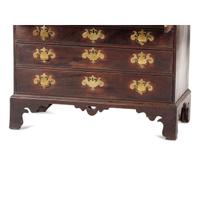A Chippendale Carved and Figured Mahogany Slant-Front Desk