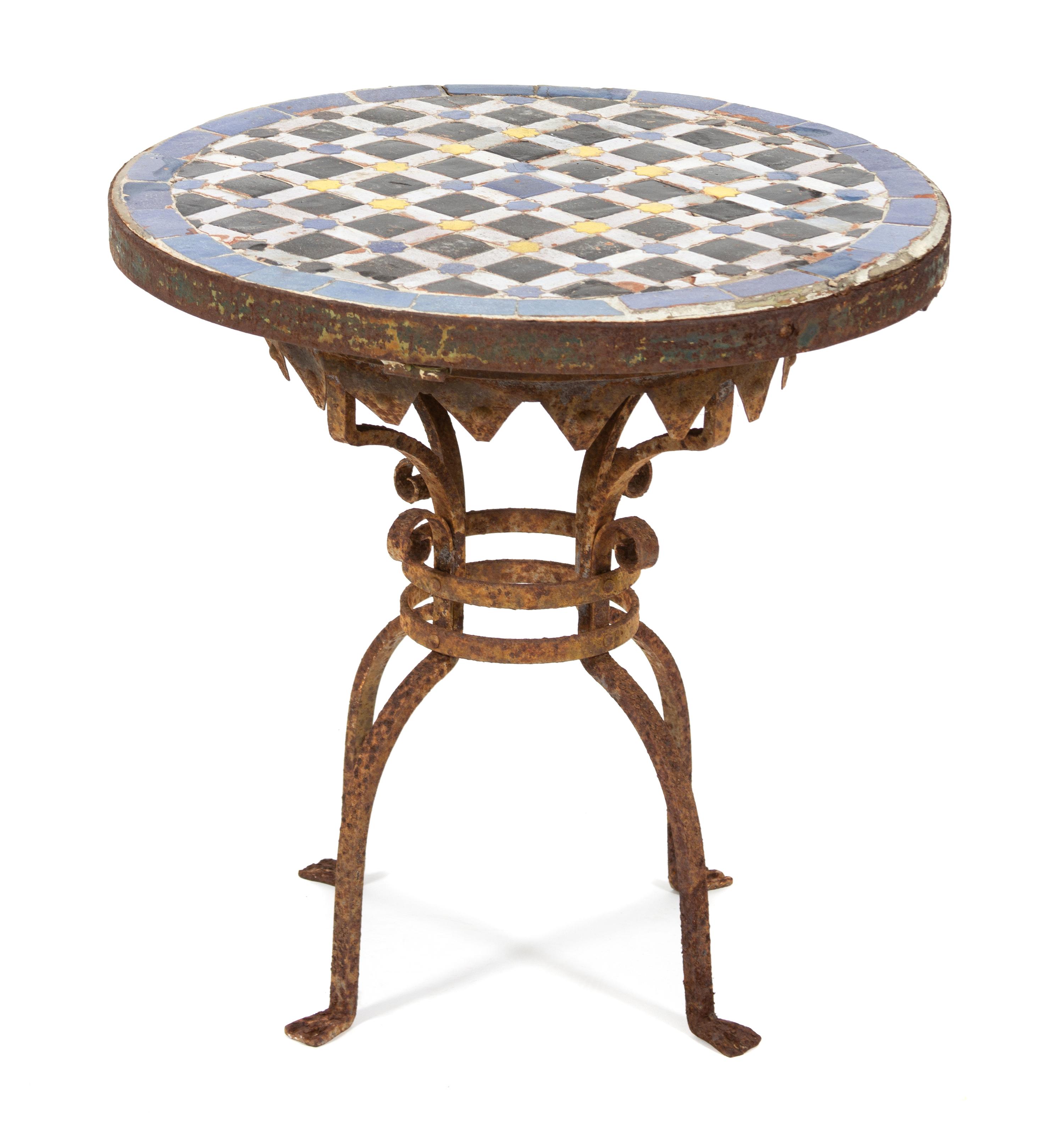 An Addison Mizner Tile Top Iron Side Table Height 20 x diameter 20 1/4 inches. — 20TH CENTURY