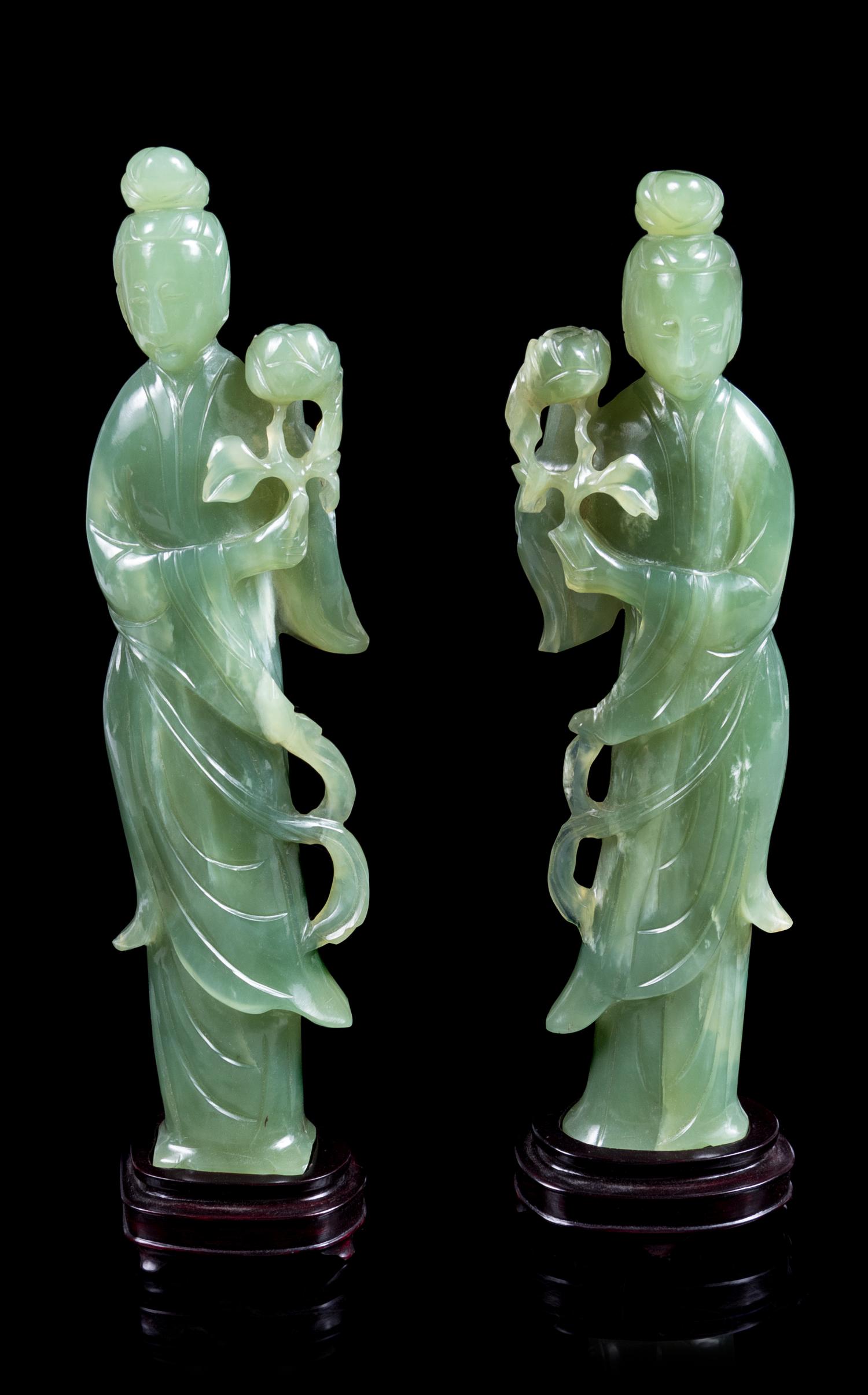 A Pair of Chinese Carved Green Hardstone Figures of Female Immortals Height of figure 11 inches. — 20TH CENTURY