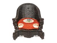 A Burmese Pierce-Carved Ironwood Slipper Chair — 19TH CENTURY