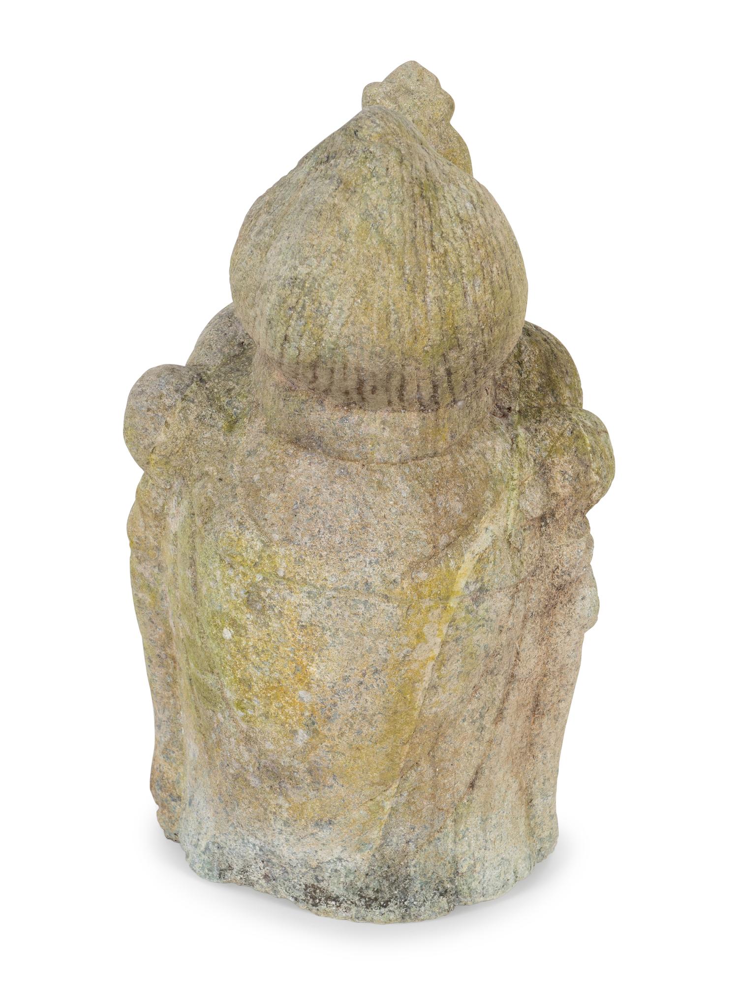 A Chinese Carved and Weathered Marble Head of Guanyin
