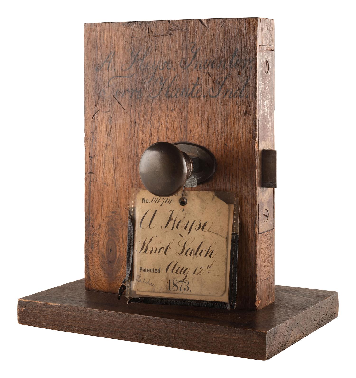 [SCIENCE & TECHNOLOGY]. A. Heyse patent model for a "Knob-Latch" with original tags. [Terre Haute, IN], 1873.