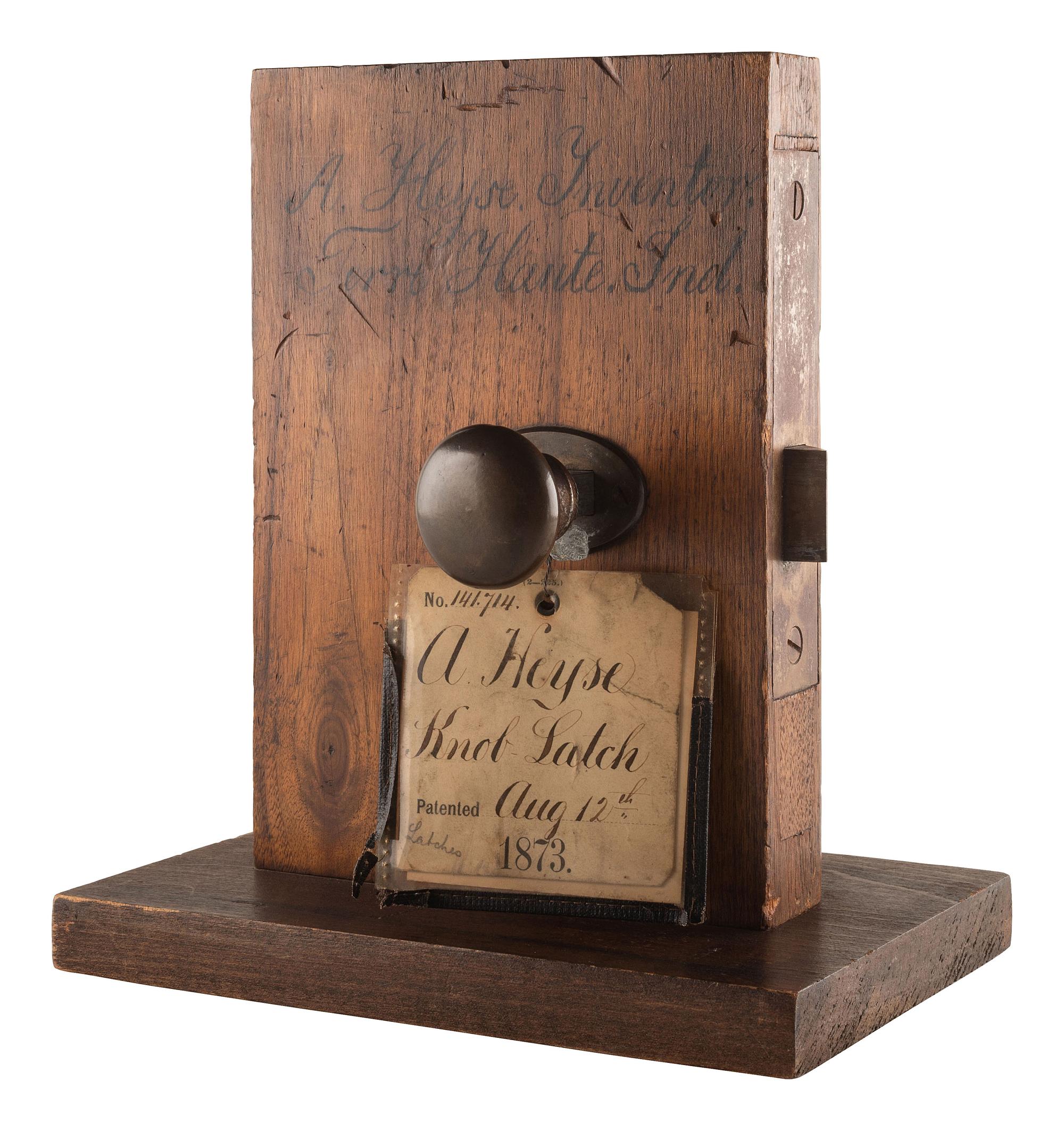 [SCIENCE & TECHNOLOGY]. A. Heyse patent model for a "Knob-Latch" with original tags. [Terre Haute, IN], 1873.