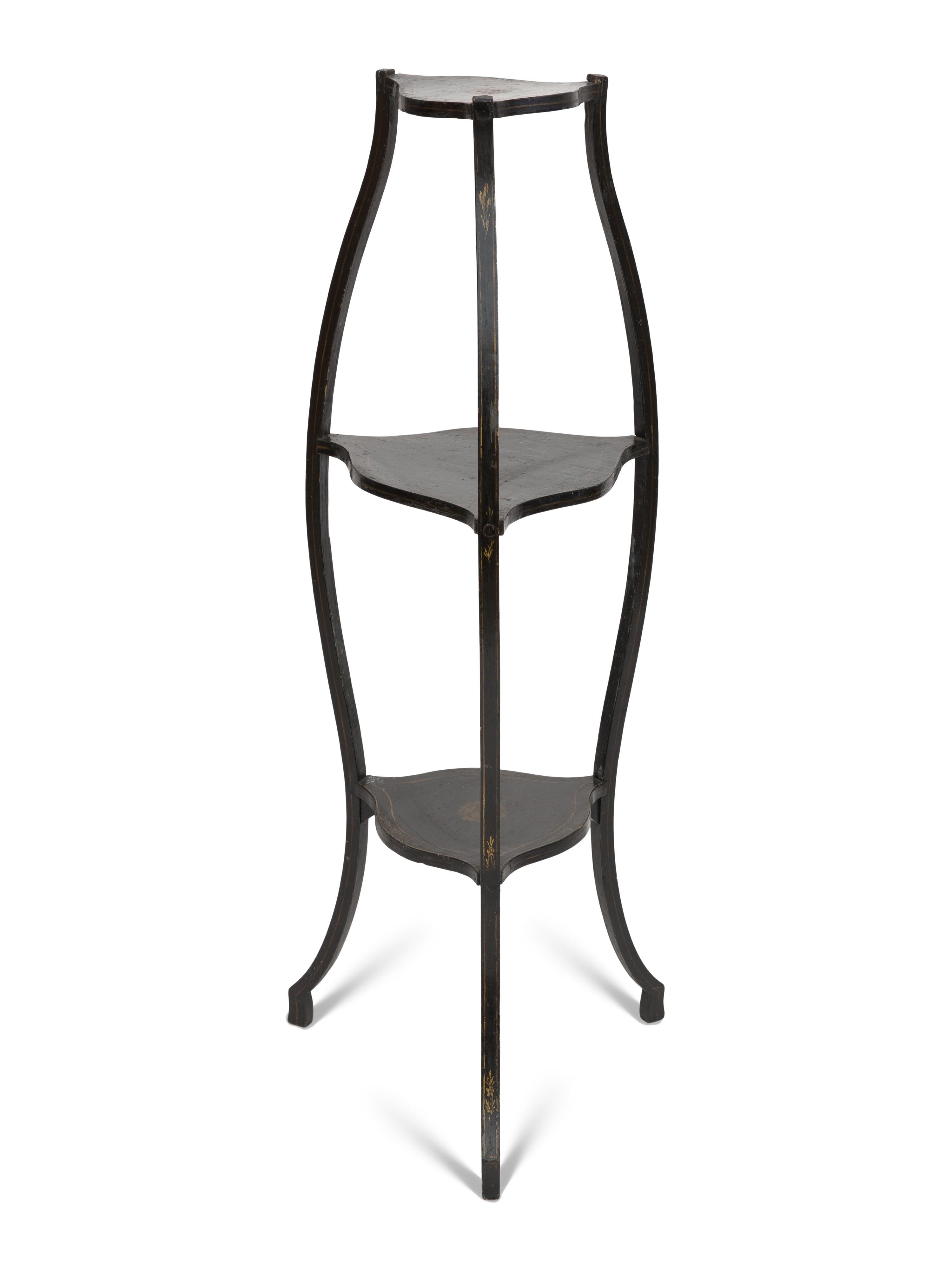A Continental Style Black-Painted and Parcel Gilt Bombe Tripod Stand