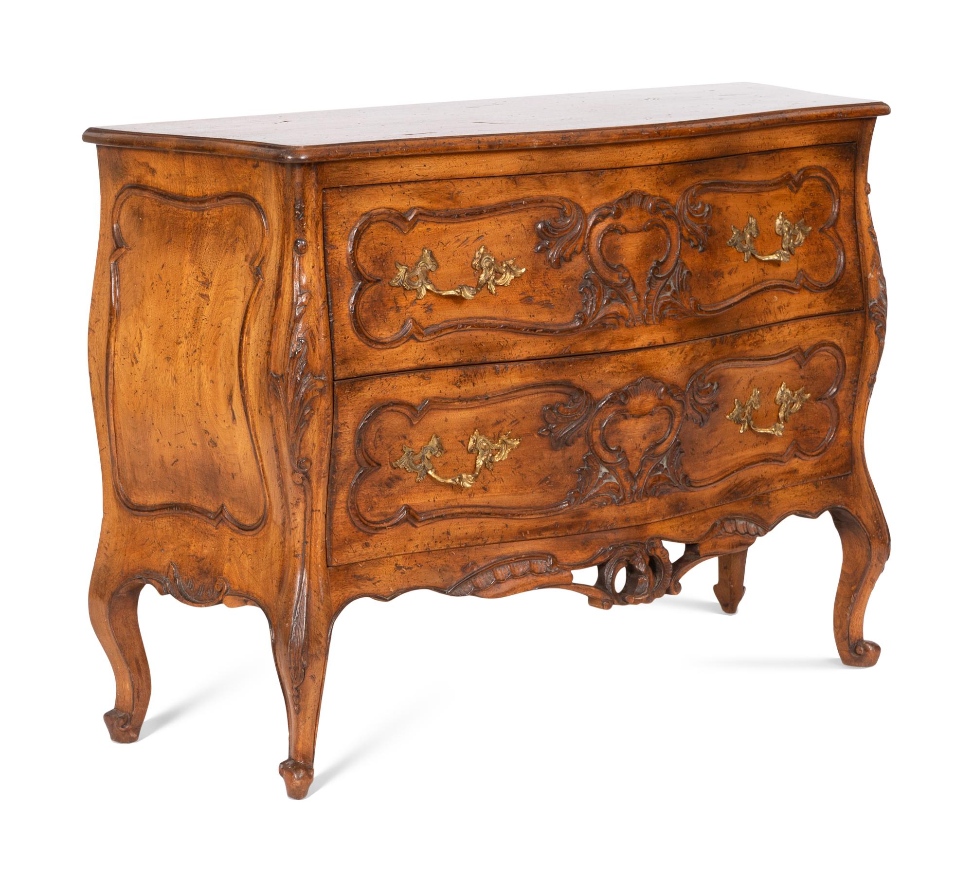 A Pair of Louis XV Style Walnut Bombé Form Commodes