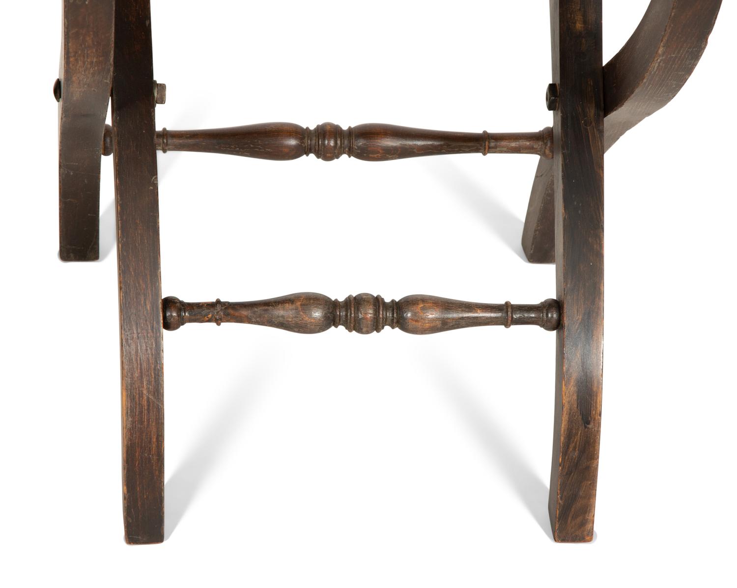 A Pair of Continental Carved Oak 'Gothic' Folding Chairs