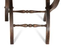 A Pair of Continental Carved Oak 'Gothic' Folding Chairs