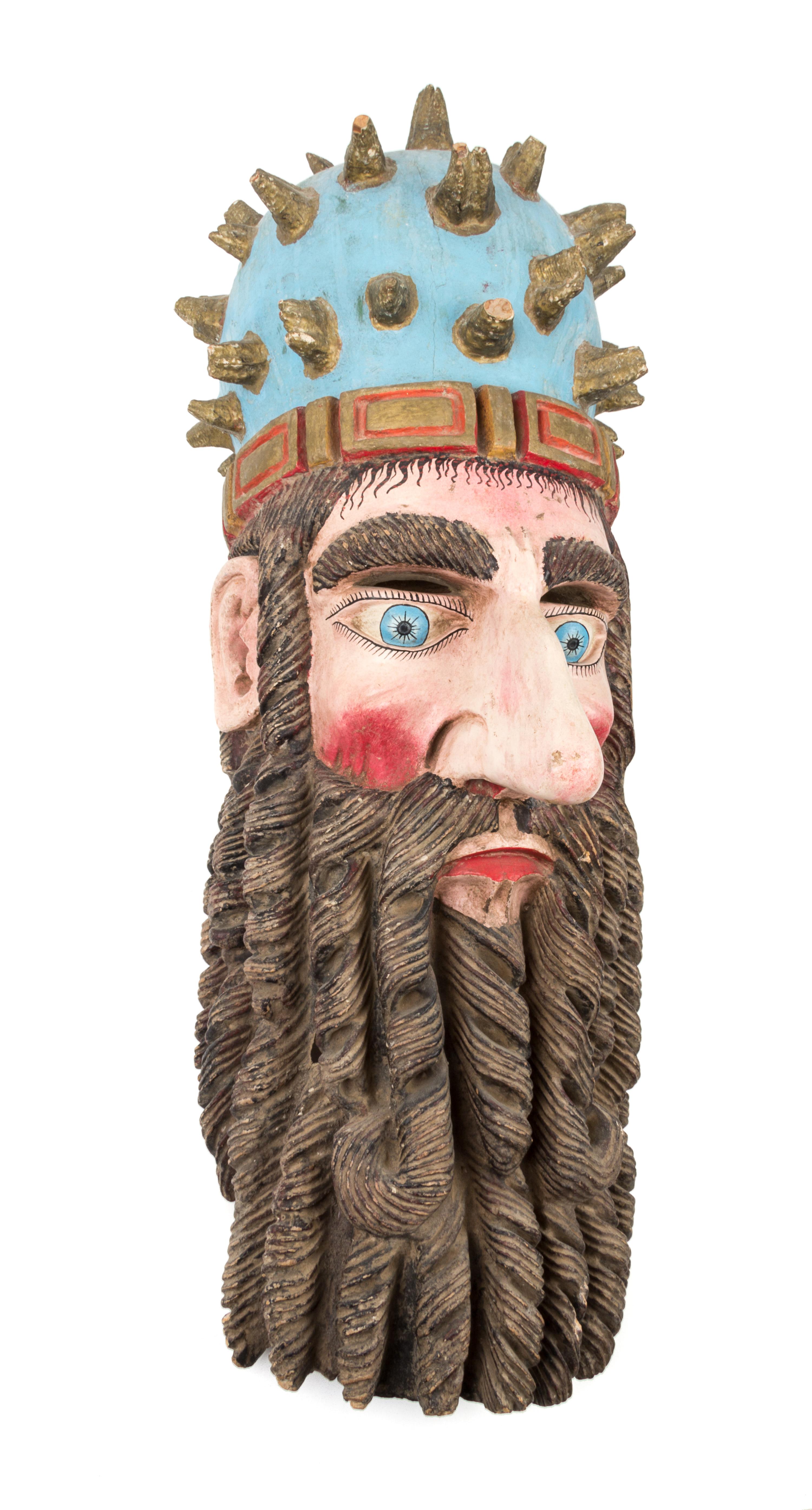 A Mexican Polychromed and Carved Wood Mask of a King Height 28 inches.