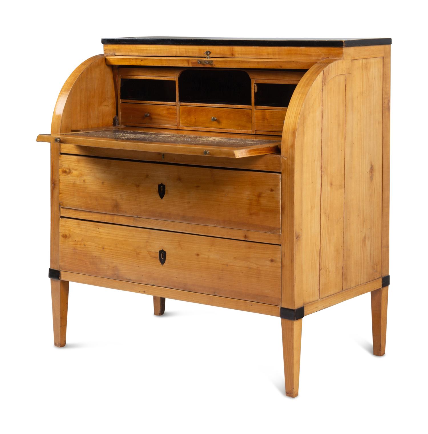 A Biedermeier Part-Ebonized Birch Cylinder Bureau