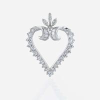 A platinum and diamond pendant/brooch