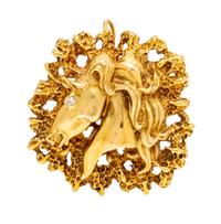 A 14 Karat Yellow Gold and Diamond Horse Head Pendant/Brooch, La Triomphe, 24.50 dwts.
