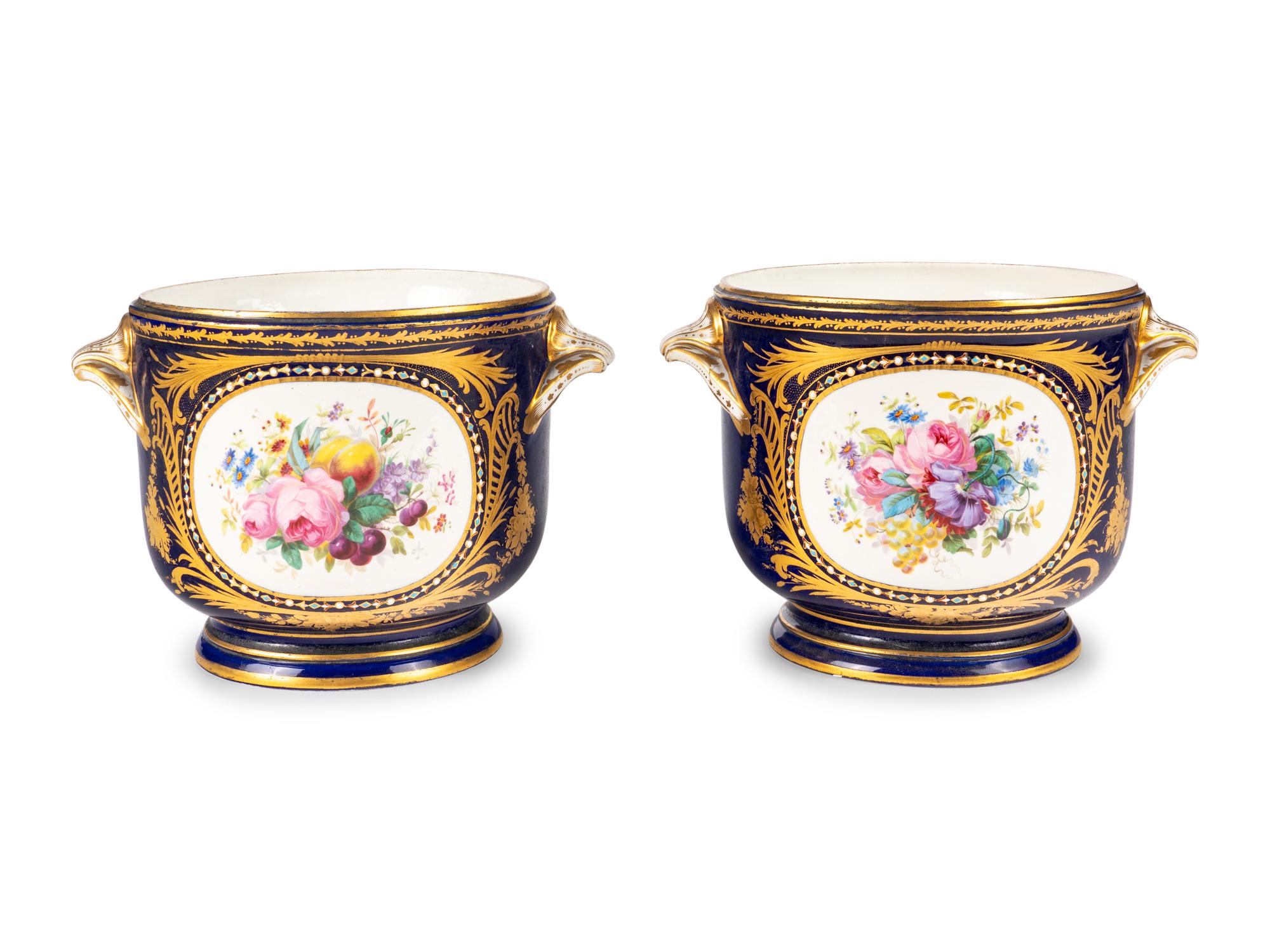 A Pair of Sèvres Style Porcelain Cache Pots
