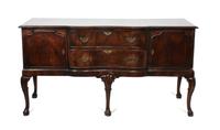 A Queen Anne Style Walnut Veneer and Mahogany Sideboard Height 35 1/2 x width 65 1/2 x depth 23 1/4