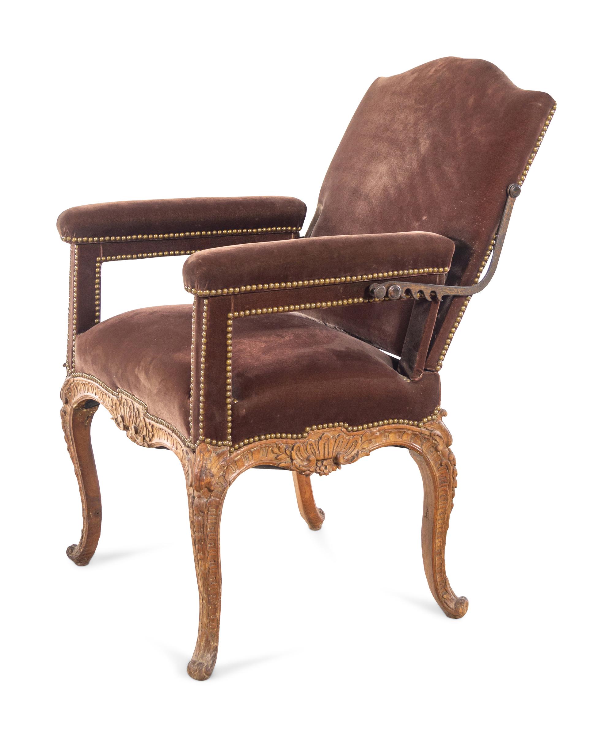 A Régence Velvet-Upholstered Carved Beechwood Reclining Armchair