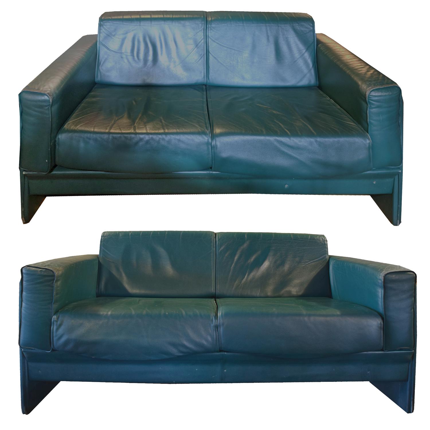 A Pair of Mid-Century Leather Sofas, from the Milan Airport 61" W x 35" D x 30" H — Italy, Mid-20th Century