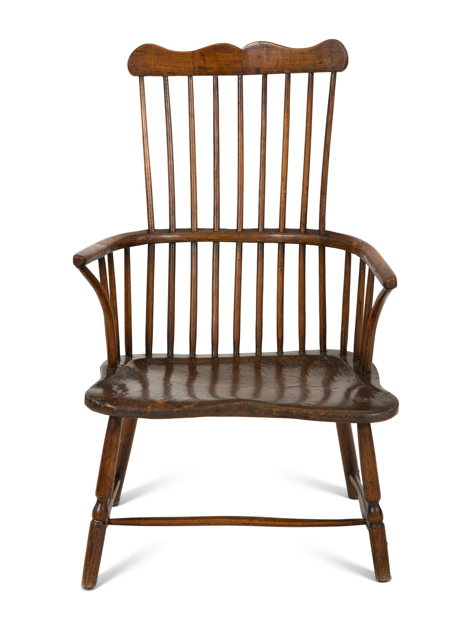 A George III Oak Comb-Back Windsor Armchair
