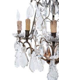 A Continental Gilt Metal and Cut Glass Eight-Light Chandelier