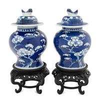 A Pair of Chinese Blue and White 'Cracked Ice and Prunus' Porcelain Covered Jars