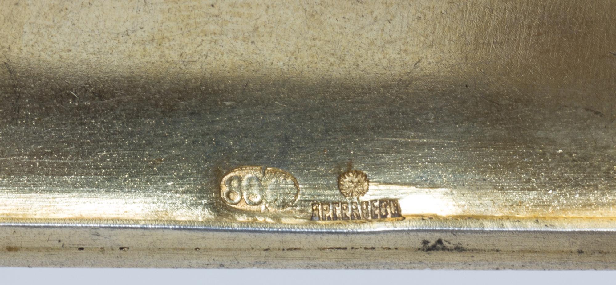 A Russian Silver-Gilt and Guilloche Enamel Cigarette Case, Mark of Grachev with Imperial warrant, St. Petersburg, the lid having a tran