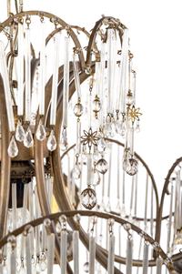 A French Mixed Metal and Cut Glass Nine-Light Chandelier
