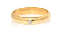 A 14 Karat Yellow Gold and Cubic Zirconia Bangle Bracelet, 18.50 dwts.