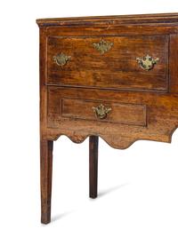 A George III Style Carved Oak Sideboard