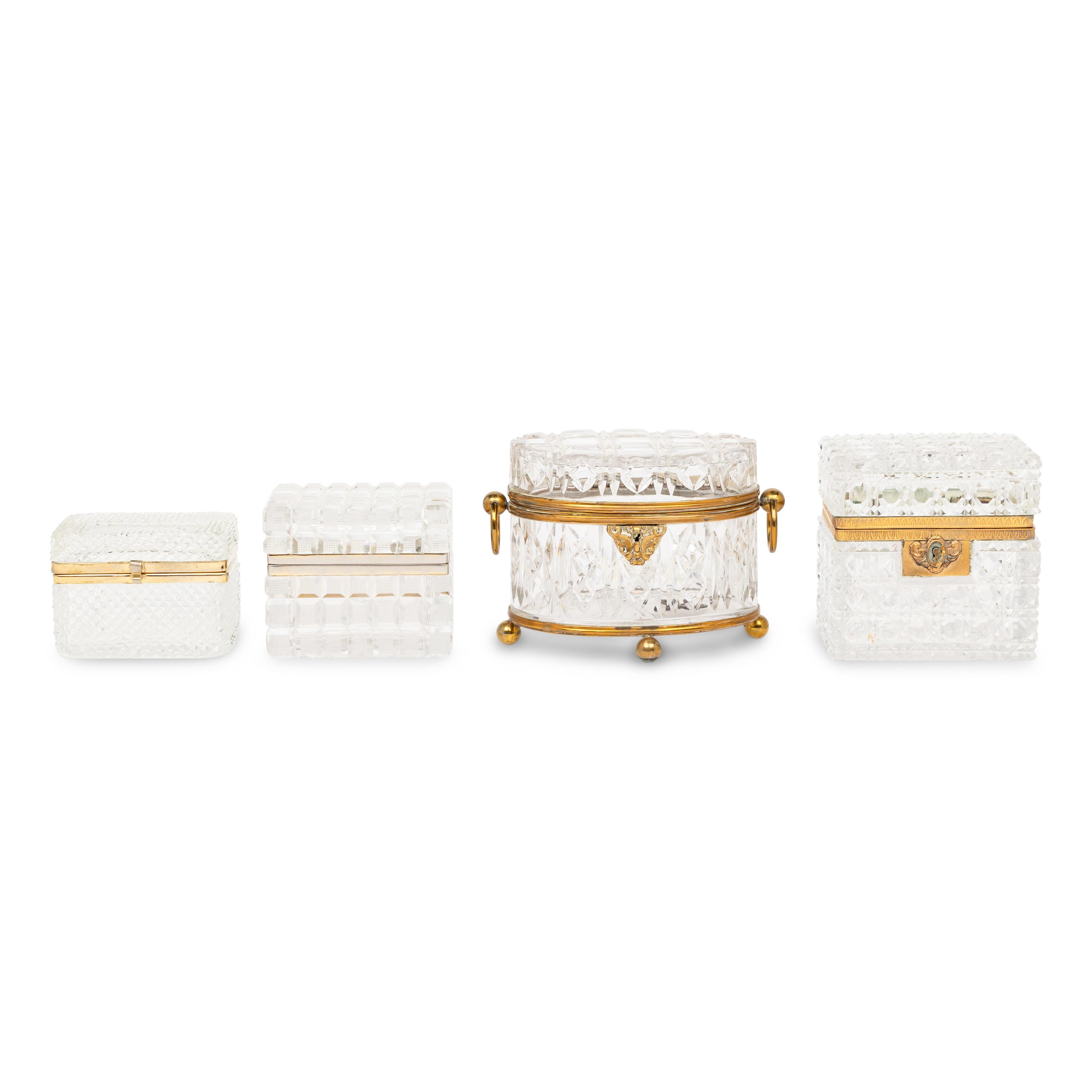 A Collection of Fourteen French Cut Glass and Gilt Metal Table Caskets