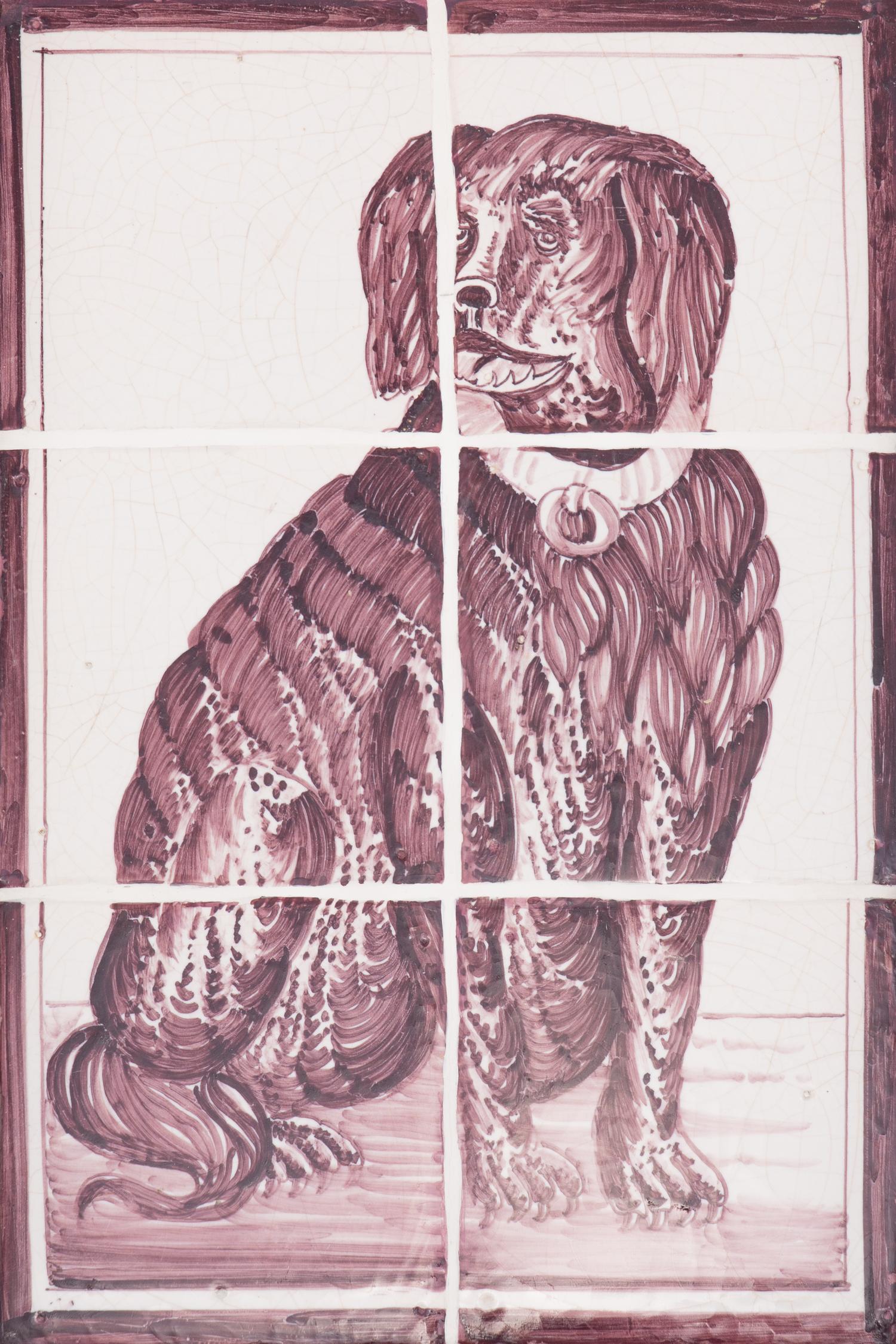 A Pair of Framed White and Sepia Glazed Tile Panels of Dogs