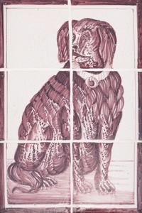 A Pair of Framed White and Sepia Glazed Tile Panels of Dogs