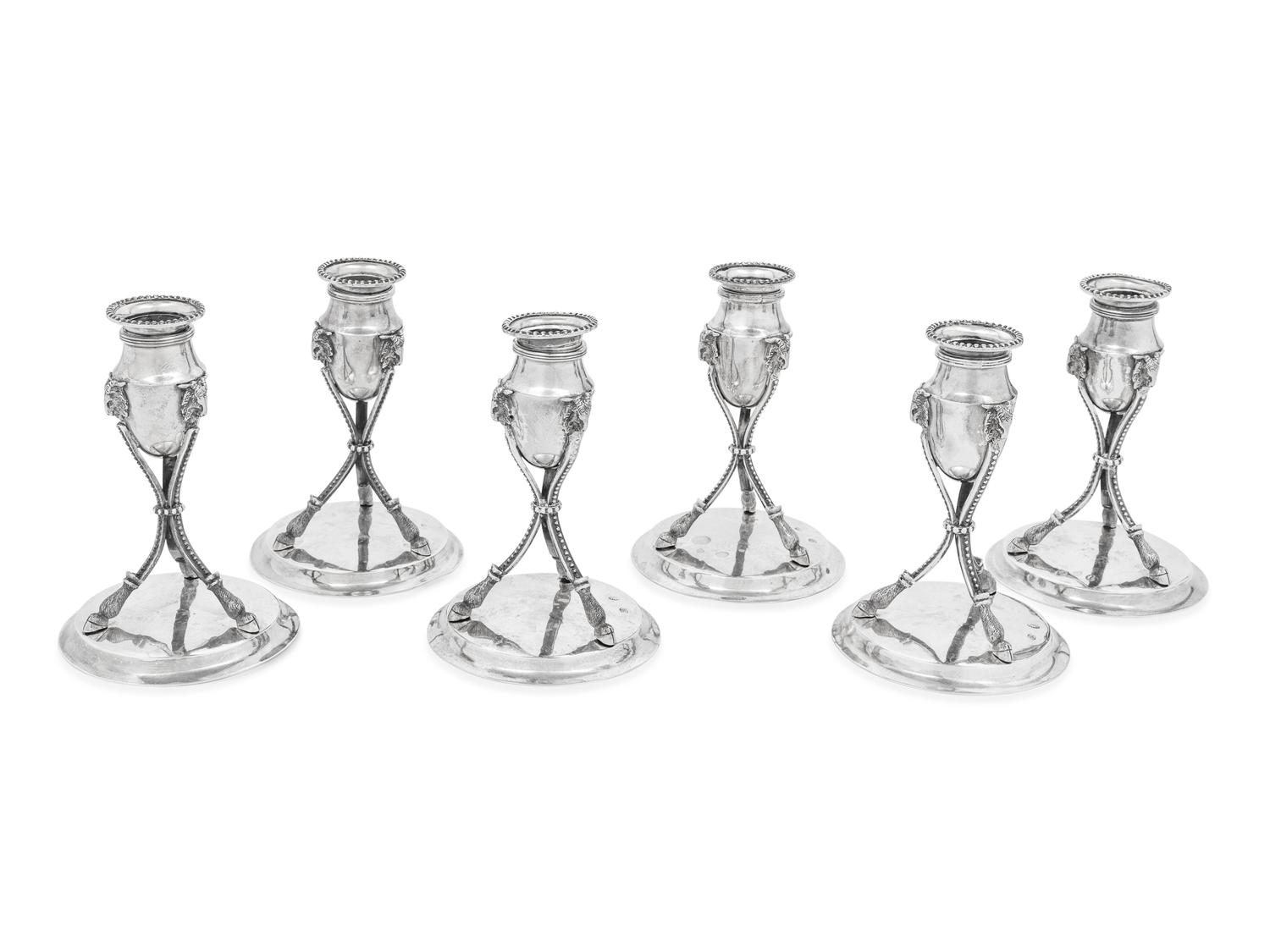 A Set of Six German Silver Candlesticks