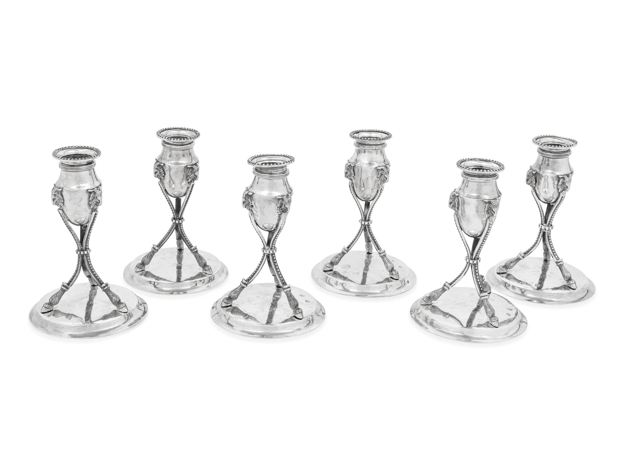 A Set of Six German Silver Candlesticks