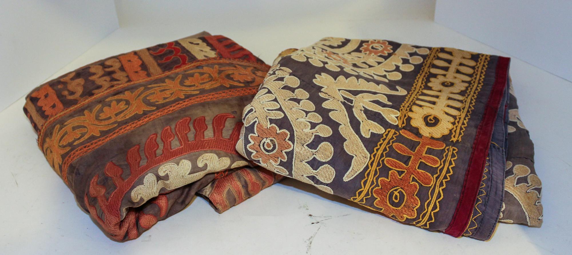 Two Middle Eastern Embroidered Silk Panels. Each approximately 84 x 106 inches.